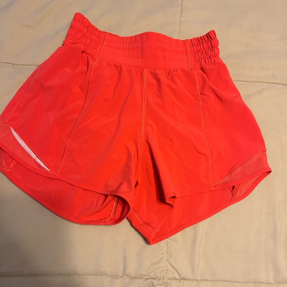 Lululemon Hotty Hot High rise 4 inch shorts in color Hot Heat!